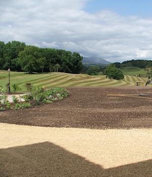 Prepared ground beside striped fairways